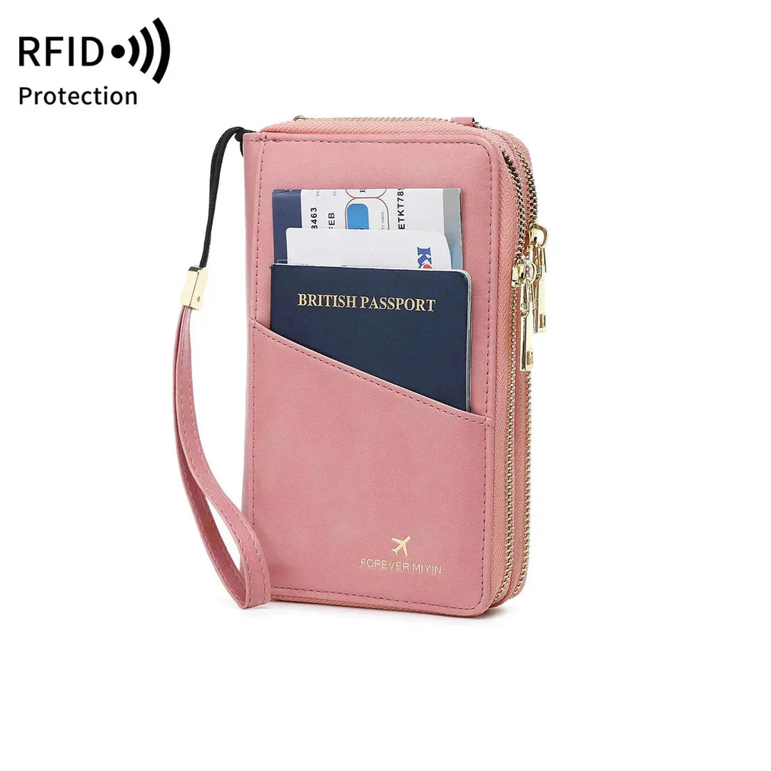 Portafoglio da viaggio rosa con protezione RFID, tasche per passaporto e carte di credito, chiusura a zip, ideale per viaggi sicuri e organizzati.