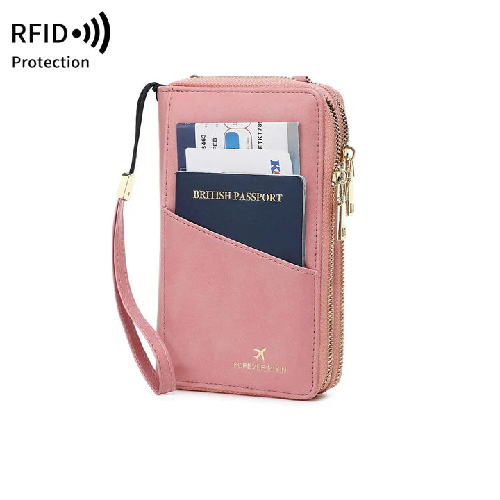 Portafoglio da viaggio rosa con protezione RFID, tasche per passaporto e carte di credito, chiusura a zip, ideale per viaggi sicuri e organizzati.