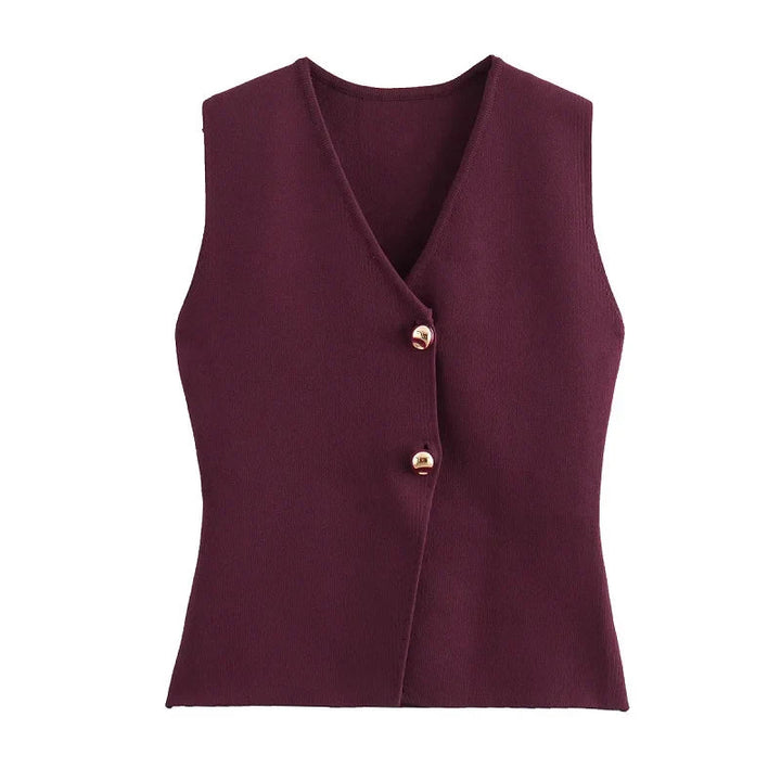 Gilet donna senza maniche bordeaux, chiusura a due bottoni dorati, elegante e moderno, ideale per moda autunnale e invernale.