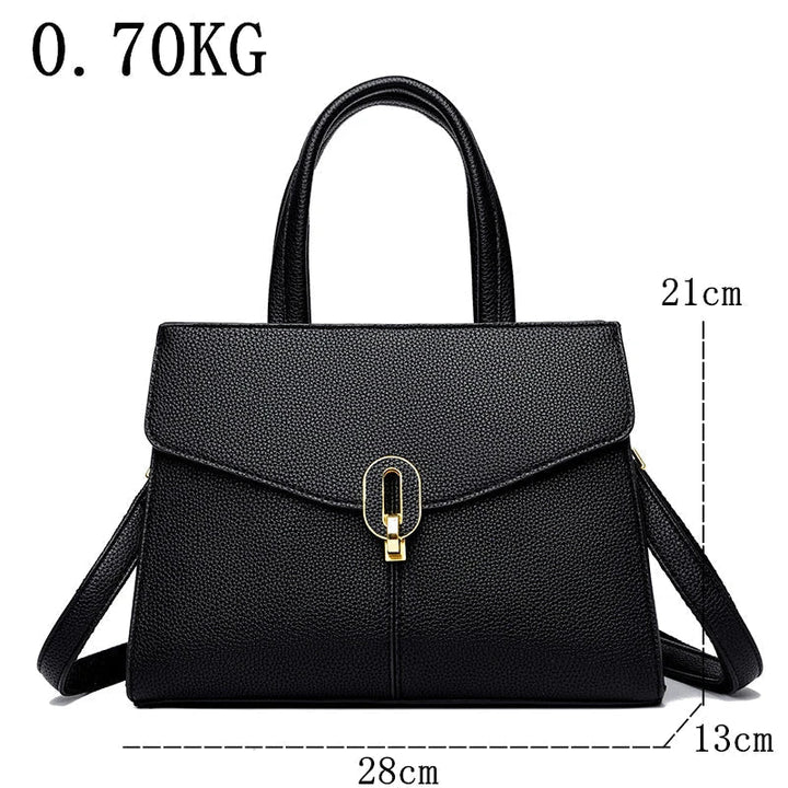 Borsa a mano nera in pelle sintetica, chiusura dorata, dimensioni 28x13x21 cm, elegante e leggera, ideale per moda femminile e shopping.