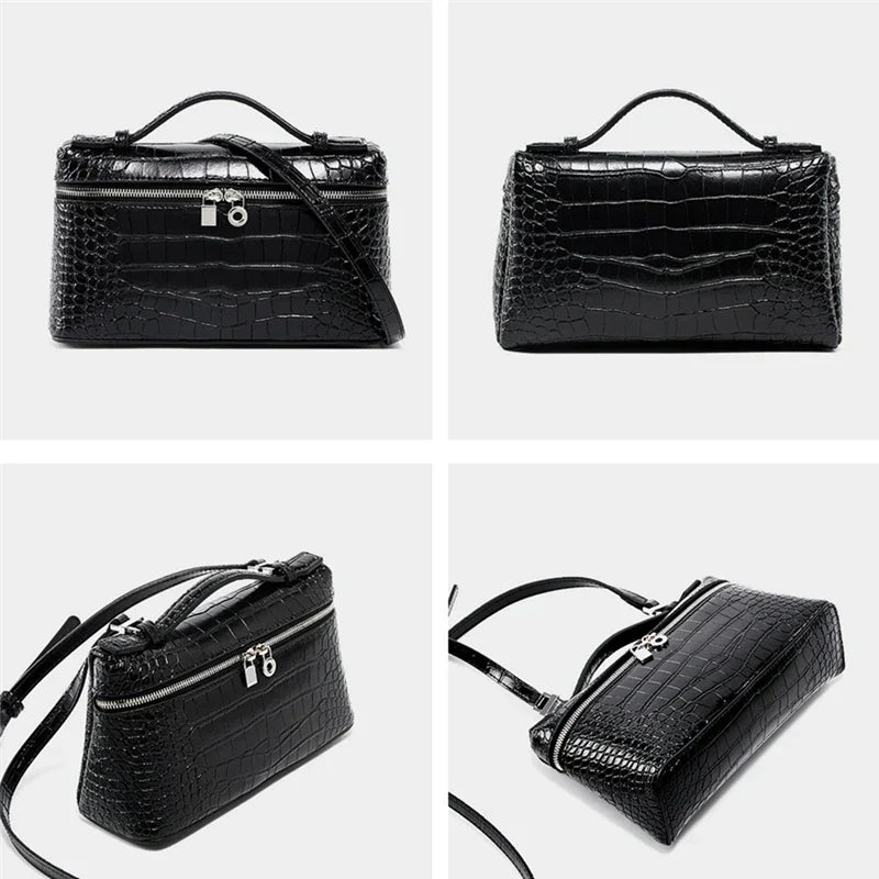 Borsa a tracolla in pelle nera effetto coccodrillo, design elegante, chiusura con zip e lucchetto, manico superiore, ideale per moda donna.