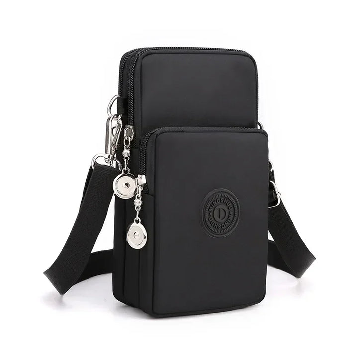 Borsa a tracolla nera multifunzione in nylon, con doppia cerniera e tasche, ideale per uomo e donna. Design moderno e pratico.