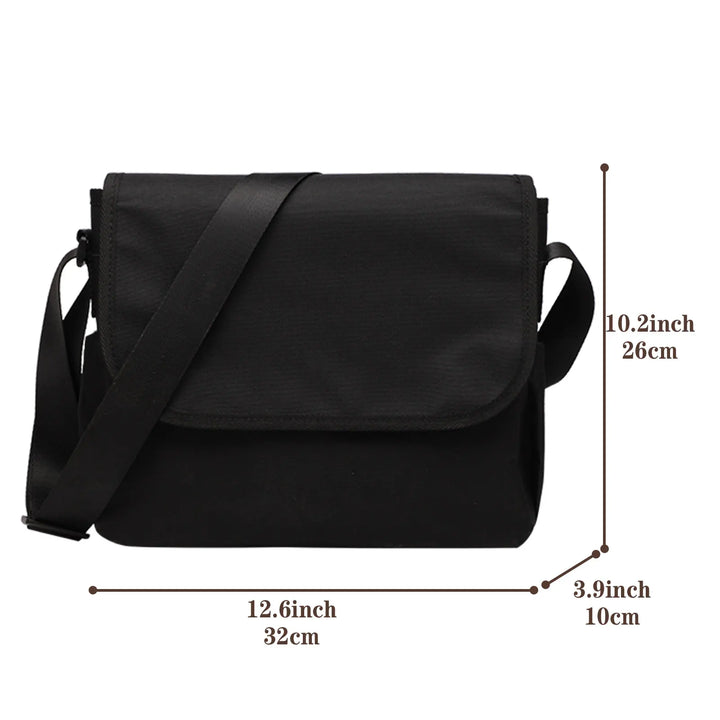 Borsa a tracolla nera unisex, dimensioni 32x26x10 cm, design minimalista, ideale per lavoro e viaggio. Materiale resistente, tracolla regolabile.