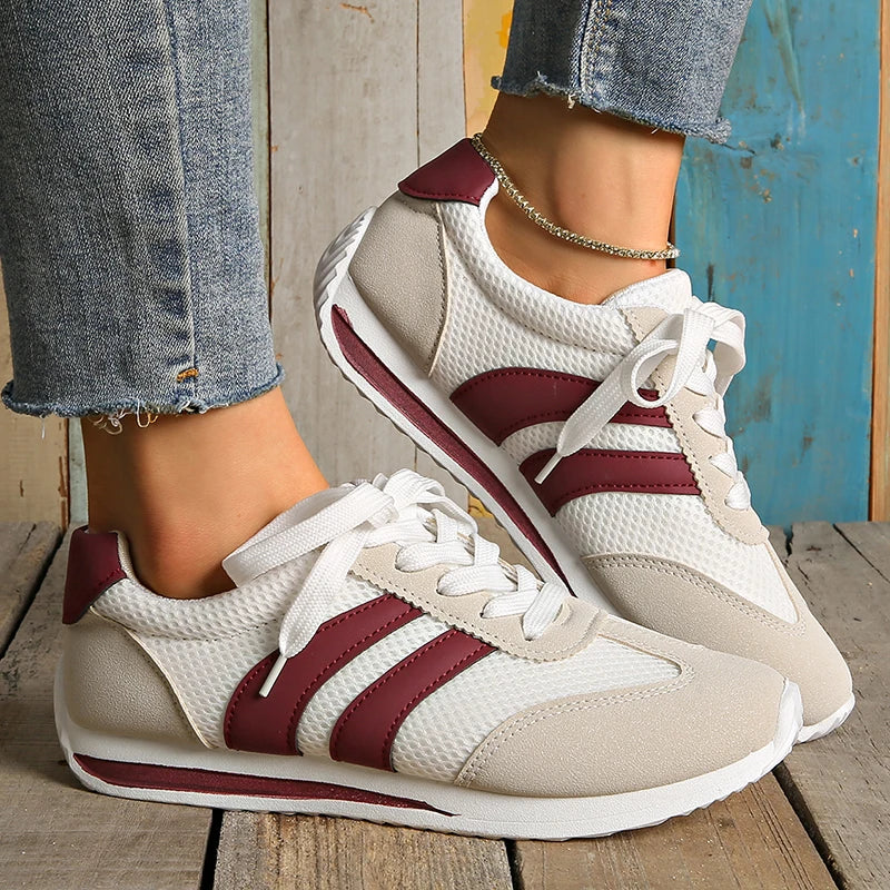 Sneakers comode con plateau e righe leggere da donna 1
