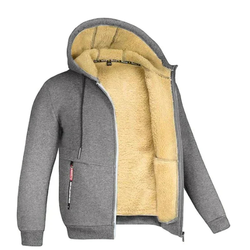 Giacca felpata con cappuccio grigia, interno in pelliccia sintetica beige, zip frontale, tasche laterali. Abbigliamento invernale caldo e confortevole.