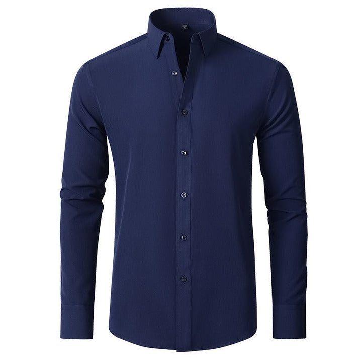 Camicia elegante uomo blu scuro, maniche lunghe, colletto classico, bottoni frontali. Moda maschile, abbigliamento formale, stile sofisticato.