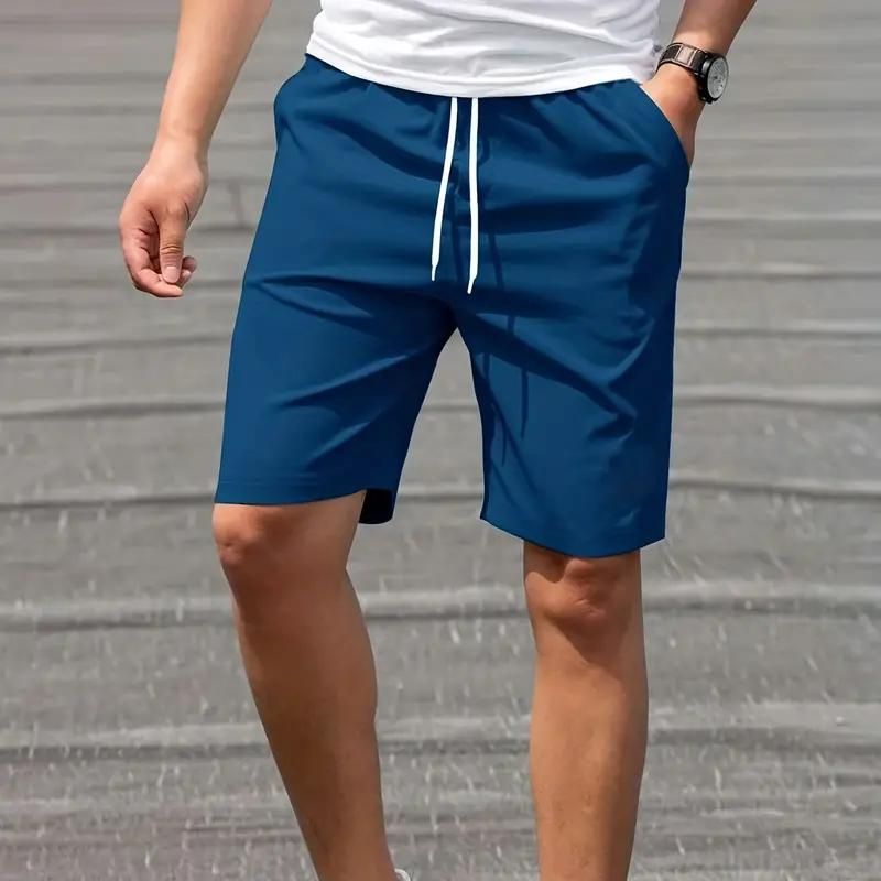 Pantaloncini sportivi uomo blu, elastico in vita con laccio bianco, tessuto leggero, ideali per attività all'aperto e fitness.