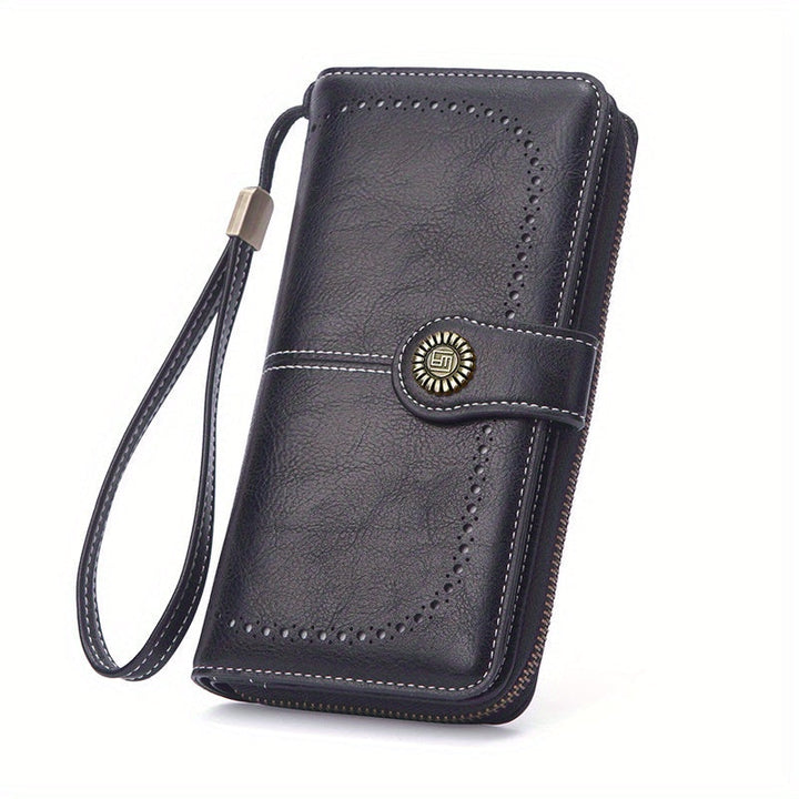 Portafoglio in pelle nera con cinturino da polso, chiusura a bottone decorativa, design elegante e funzionale, ideale per uomo e donna.