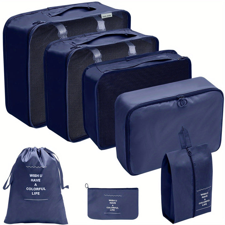 Set di organizer da viaggio blu scuro, include cinque borse di diverse dimensioni e una pochette, ideali per valigie e zaini.