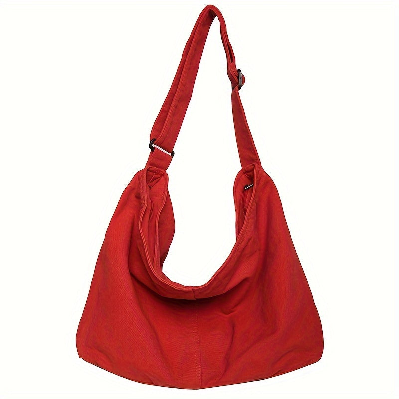Borsa a tracolla rossa in tessuto, design casual, con cinghia regolabile. Perfetta per uso quotidiano e moda urbana. Accessorio versatile e trendy.