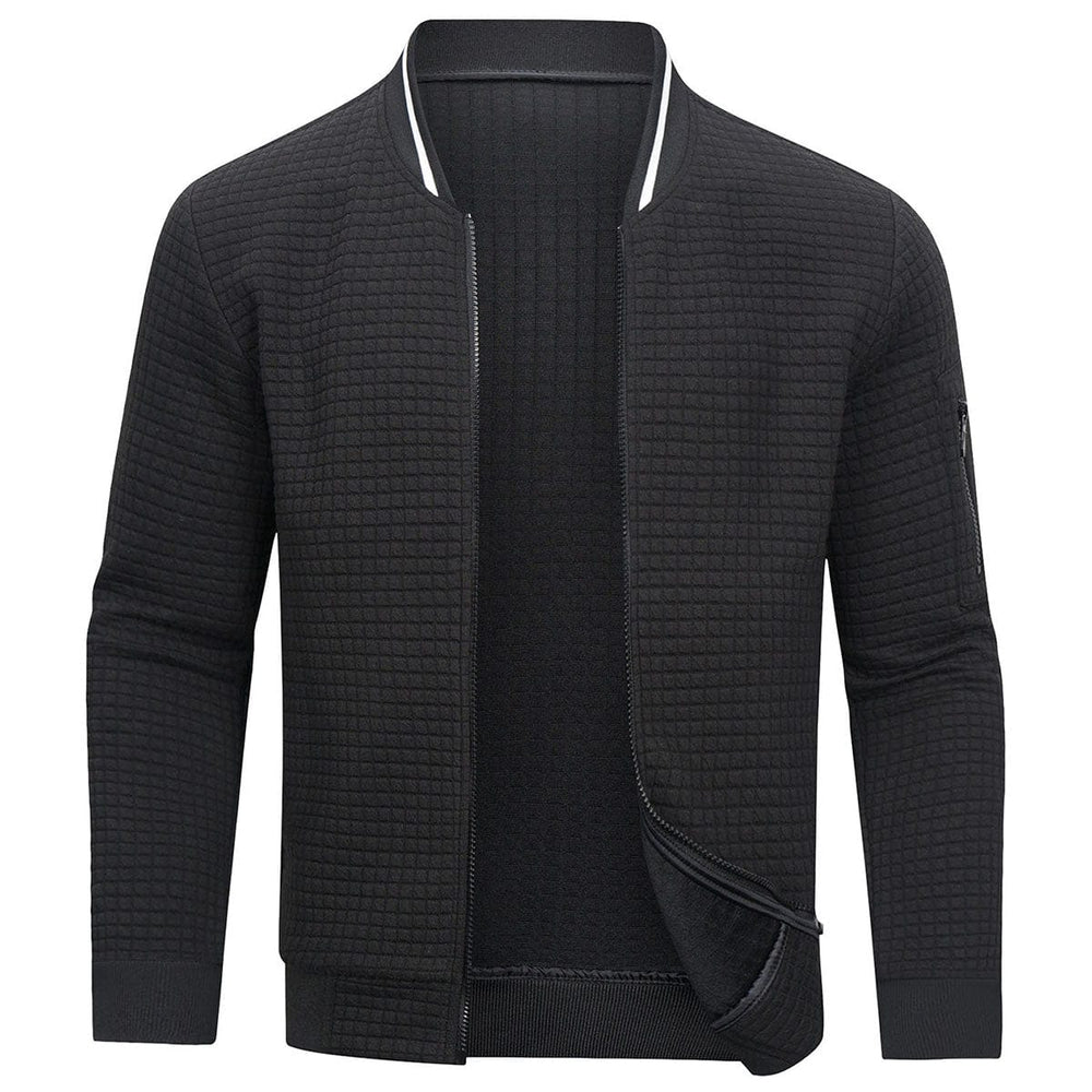 Giacca bomber nera trapuntata da uomo, design casual, chiusura con zip, colletto a costine, ideale per moda autunnale e invernale.
