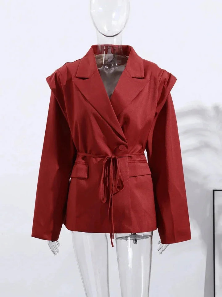 Blazer femme jaune à laçage, avec épaulettes, en tissu léger et respirant.