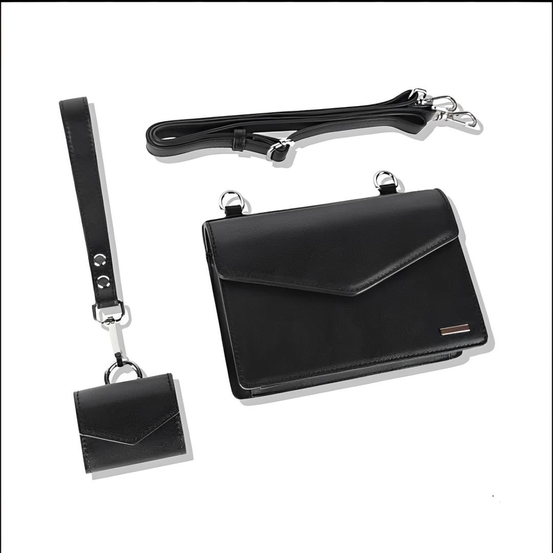 Borsa a tracolla nera in pelle con cinturino regolabile e portachiavi coordinato. Elegante accessorio moda donna.