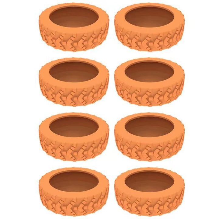 Otto vasi da giardino a forma di pneumatico arancione, design robusto, ideali per piante e fiori, decorazione esterna, resistente alle intemperie.