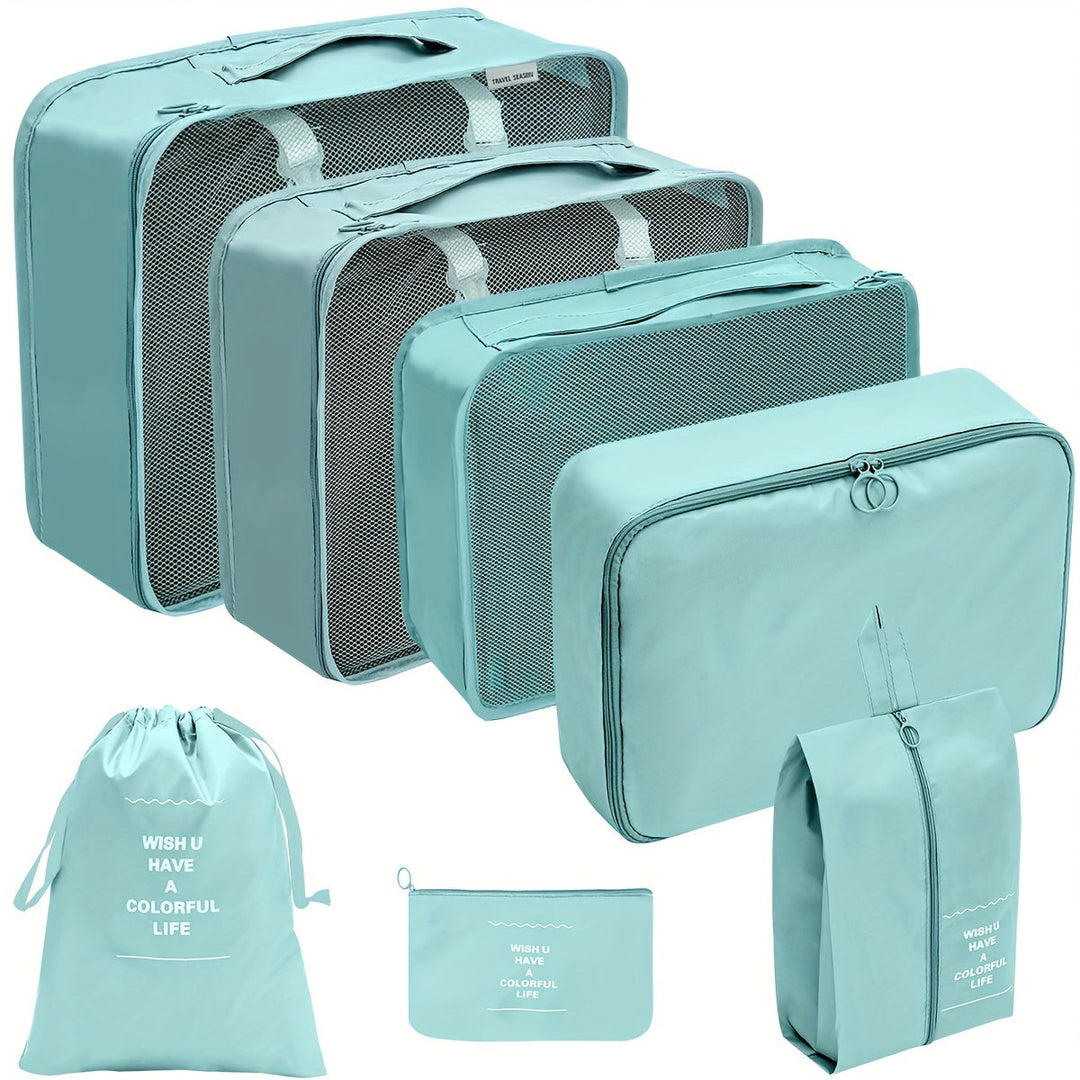Set di organizer da viaggio in tessuto azzurro, include cinque borse di diverse dimensioni e una sacca, ideali per valigie e bagagli.