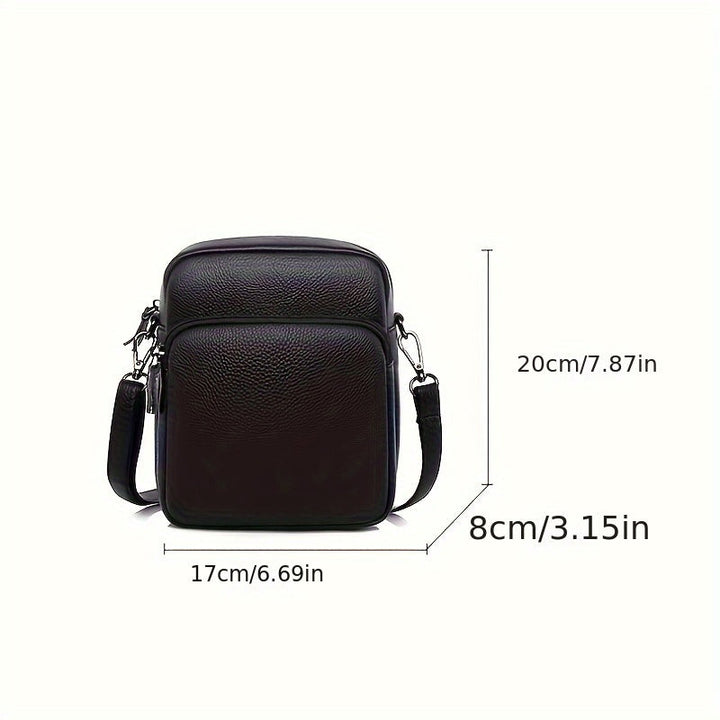 Borsa a tracolla in pelle nera, dimensioni 20x17x8 cm, con tasca frontale e tracolla regolabile. Elegante e pratica per uomo e donna.