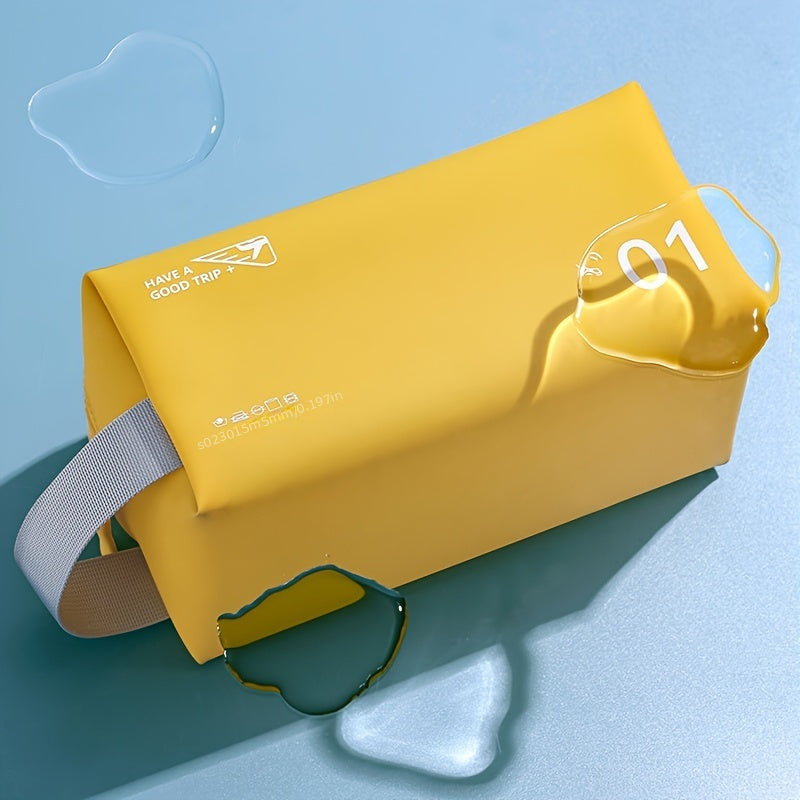 Astuccio da viaggio giallo impermeabile con manico grigio, design moderno, ideale per cosmetici. Perfetto per organizzare accessori in viaggio.