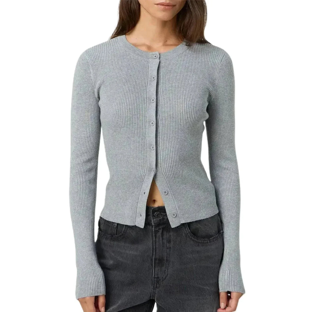 Cardigan femme ajusté jaune à manches longues côtelées en matière douce et extensible.