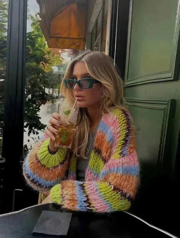 Multicolour striped cardigan for women, made of soft knit fabric, featuring a relaxed fit and open front design.