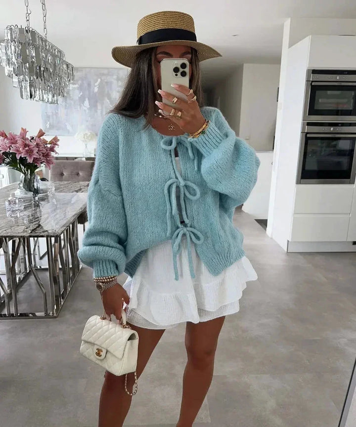 Cardigan femme kaki, design noué, manches amples, en tricot doux, coupe décontractée.