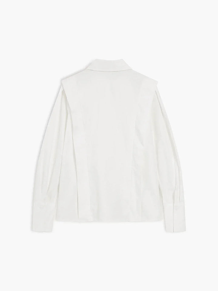Chemisier oversize femme, en coton léger, avec détails boutonnés sur les manches et coupe décontractée, parfait pour le…