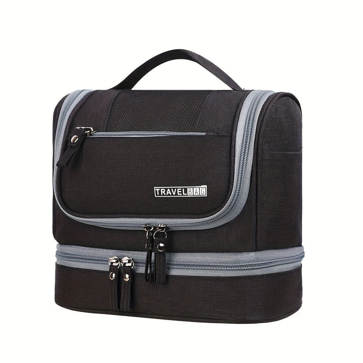 Borsa da viaggio nera con manico, doppia cerniera e tasca frontale. Design compatto, ideale per organizzare accessori da viaggio.