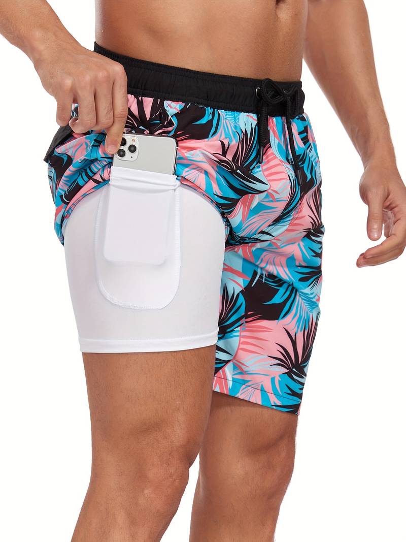 Pantaloncini da nuoto uomo con tasca laterale, design tropicale blu e rosa, perfetti per spiaggia e piscina. Tasche per smartphone.