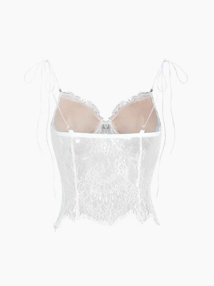 Débardeur femme en coton avec dentelle ajustable et fines bretelles, idéal pour un look élégant et décontracté.