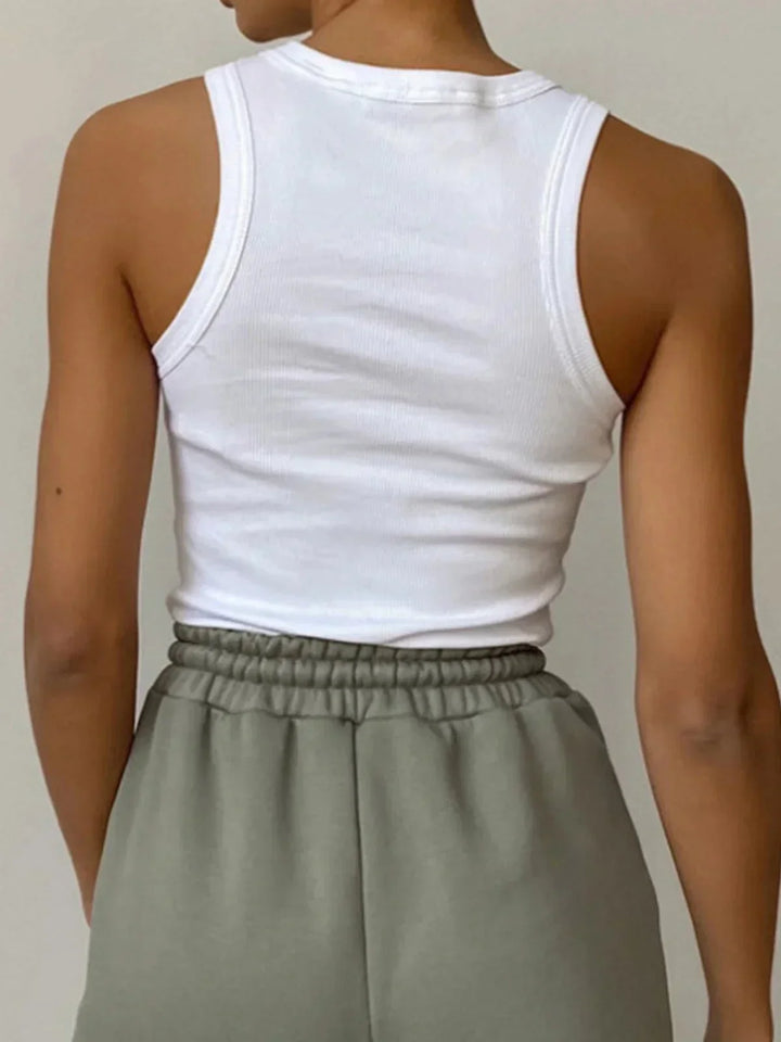 Débardeur sans manches femme en coton côtelé, design ajustable, polyvalent pour une utilisation quotidienne.