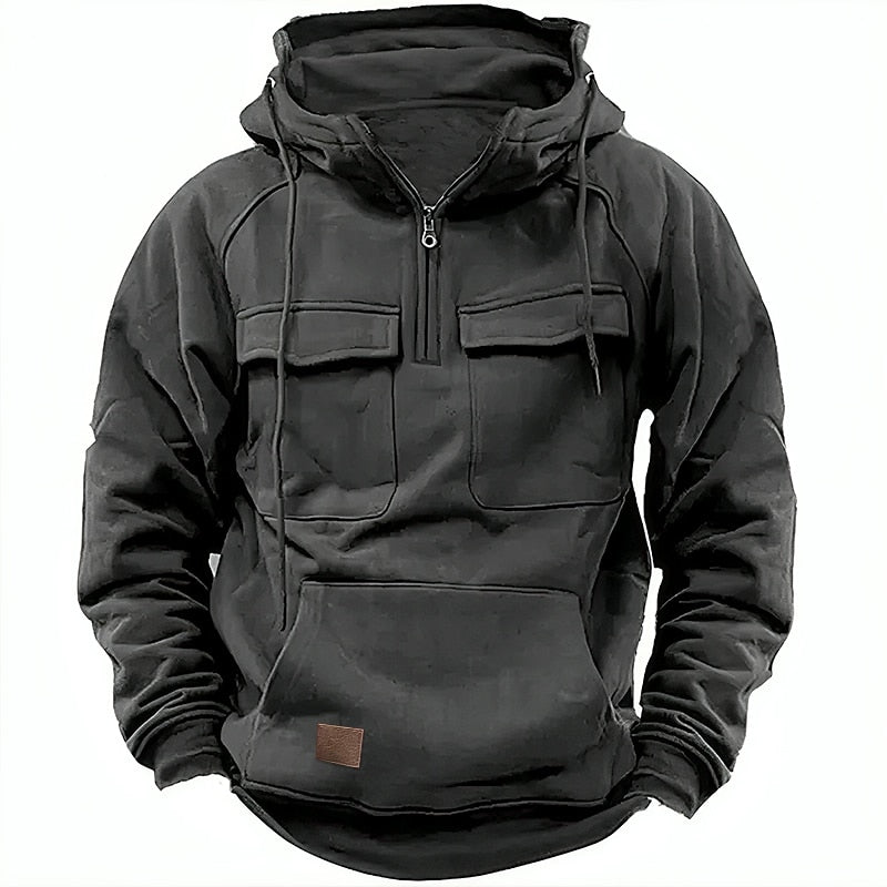 Felpa nera con cappuccio, tasche frontali e zip, design casual e sportivo, ideale per l'autunno e l'inverno. Abbigliamento uomo alla moda.