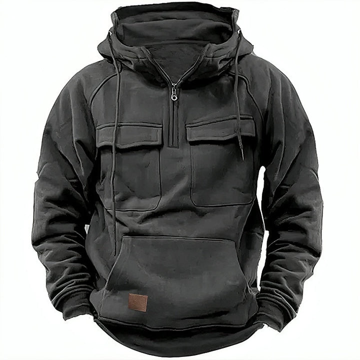 Felpa nera con cappuccio, tasche frontali e zip, design casual e sportivo, ideale per l'autunno e l'inverno. Abbigliamento uomo alla moda.