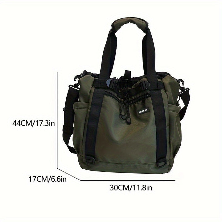 Borsa a tracolla verde militare, dimensioni 44x30x17 cm, con manici neri e tasche laterali. Ideale per viaggi e uso quotidiano.