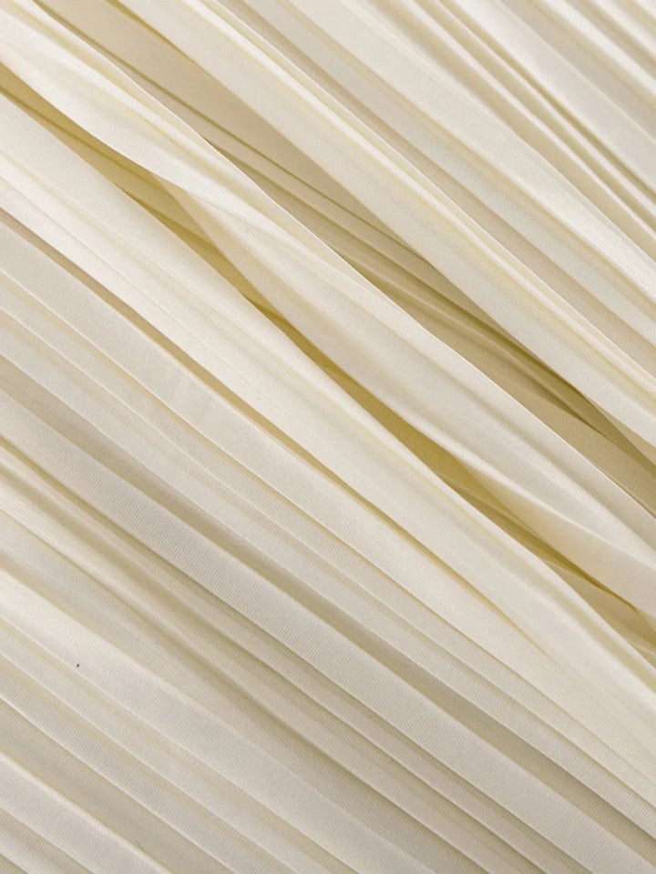 Ensemble deux pièces plissé blanc en mélange de coton léger, coupe décontractée, adapté pour le quotidien et les loisirs.