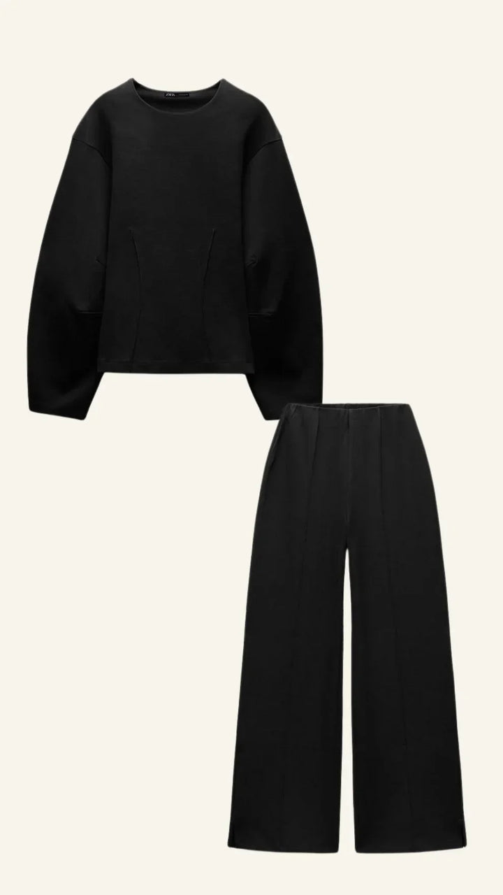 Ensemble gris pour femme composé d'un pull décontracté et d'un pantalon à coupe ample en mélange de coton.