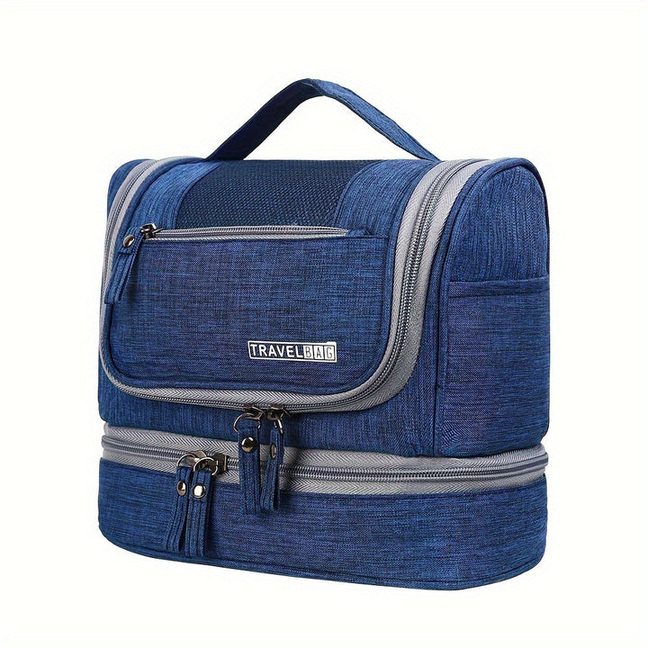 Borsa da viaggio blu con manico, tasche multiple e cerniere, ideale per organizzare articoli da toeletta. Design compatto e resistente.