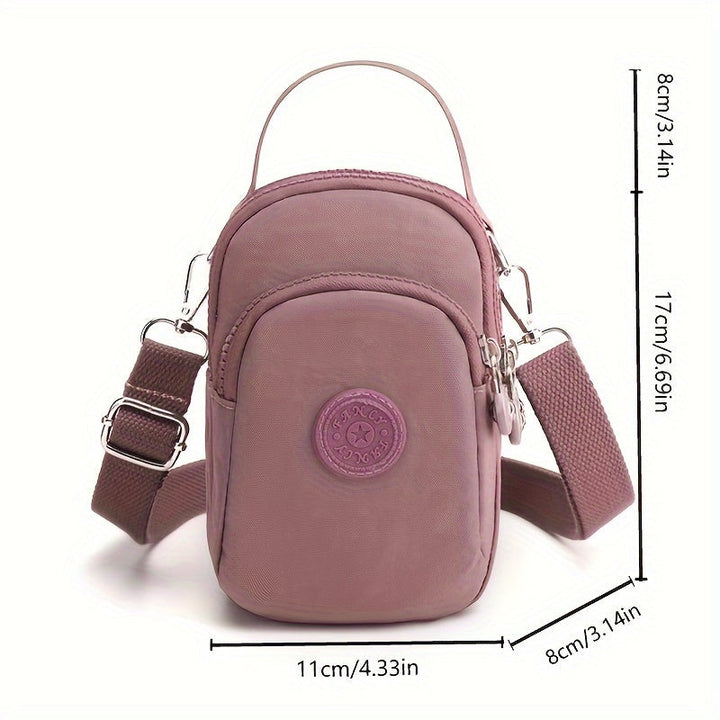 Borsa a tracolla piccola rosa, design compatto, con tasca frontale e cerniera, dimensioni 17x11x8 cm, ideale per donna, moda casual.