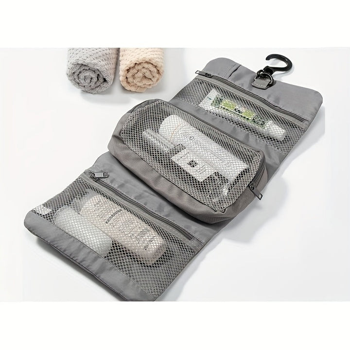 Borsa da viaggio grigia con gancio, scomparti a rete, contenente articoli da toeletta. Ideale per organizzare prodotti cosmetici e accessori.
