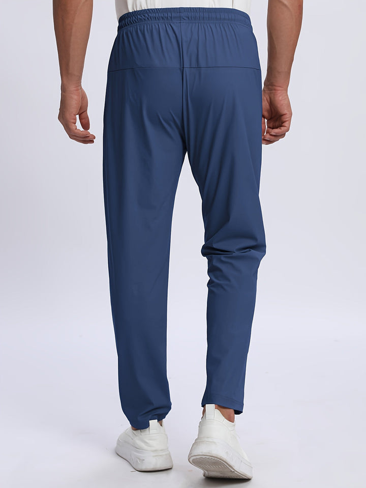 Pantaloni Uomo Sportivi Tessuto Elasticizzato Tasche con Zip