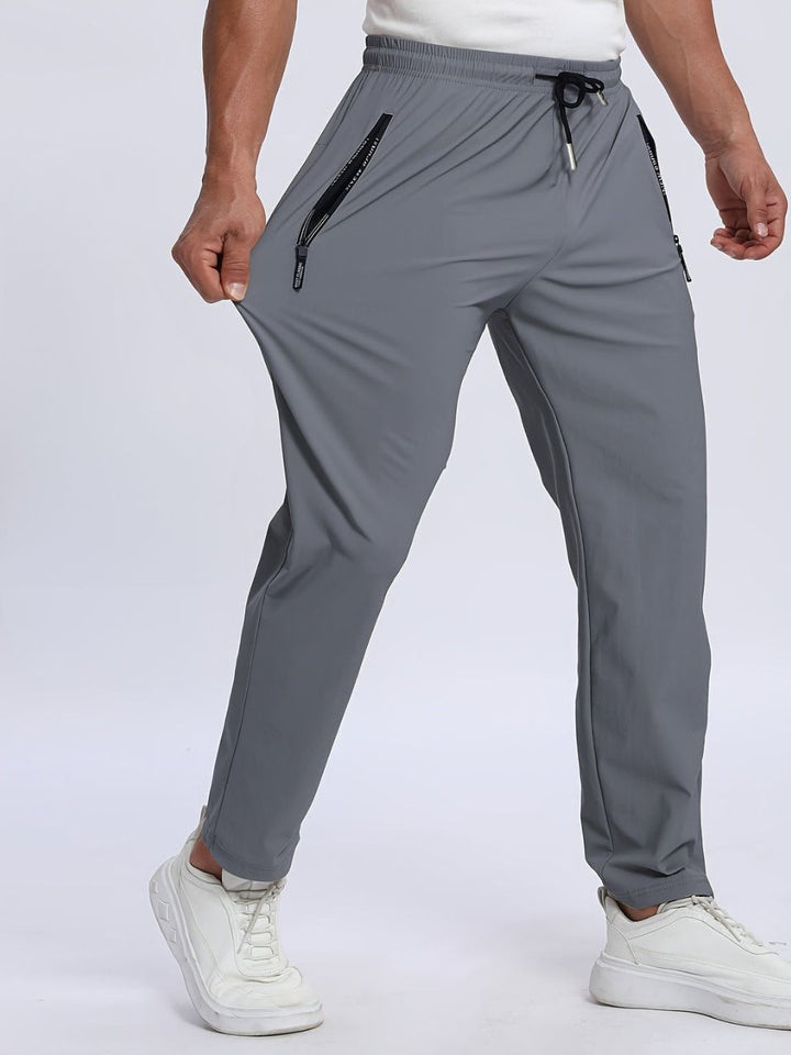Pantaloni Uomo Sportivi Tessuto Elasticizzato Tasche con Zip - Vesarelli