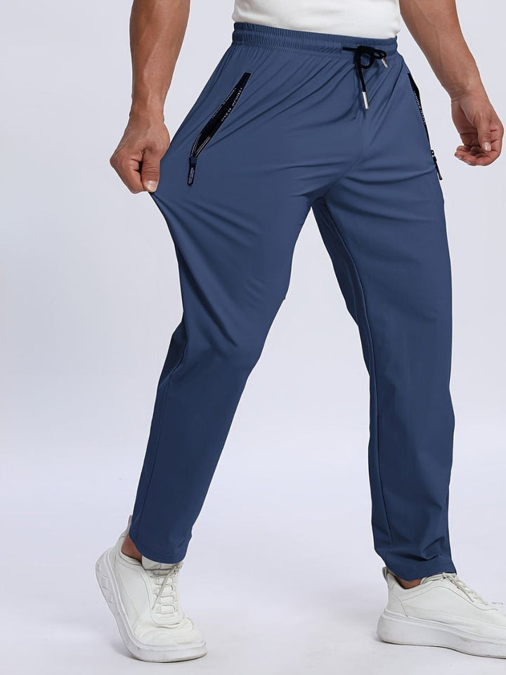 Pantaloni Uomo Sportivi Tessuto Elasticizzato Tasche con Zip