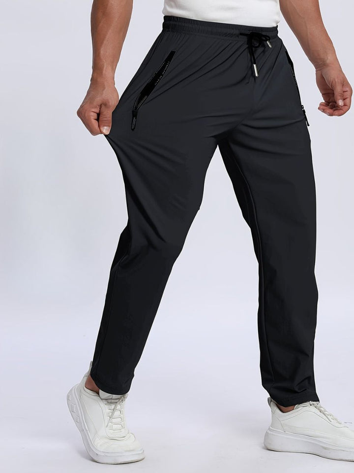 Pantaloni Uomo Sportivi Tessuto Elasticizzato Tasche con Zip