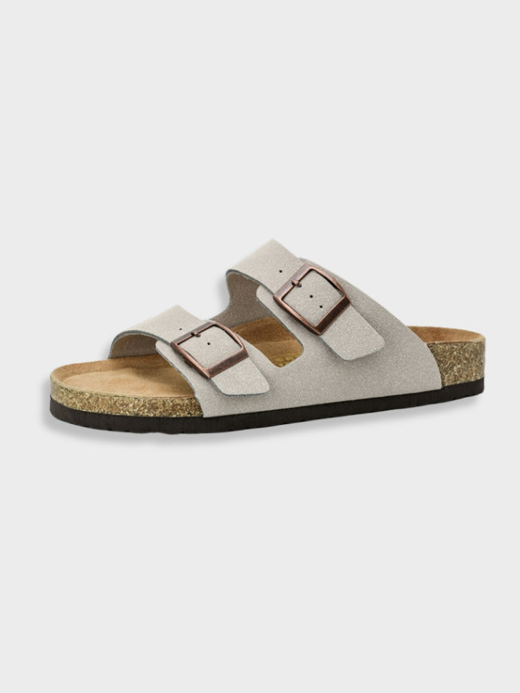 Sandalo Birkenstock Arizona unisex, colore grigio chiaro, con doppia fibbia regolabile e suola in sughero. Comodo, casual, ideale per l&