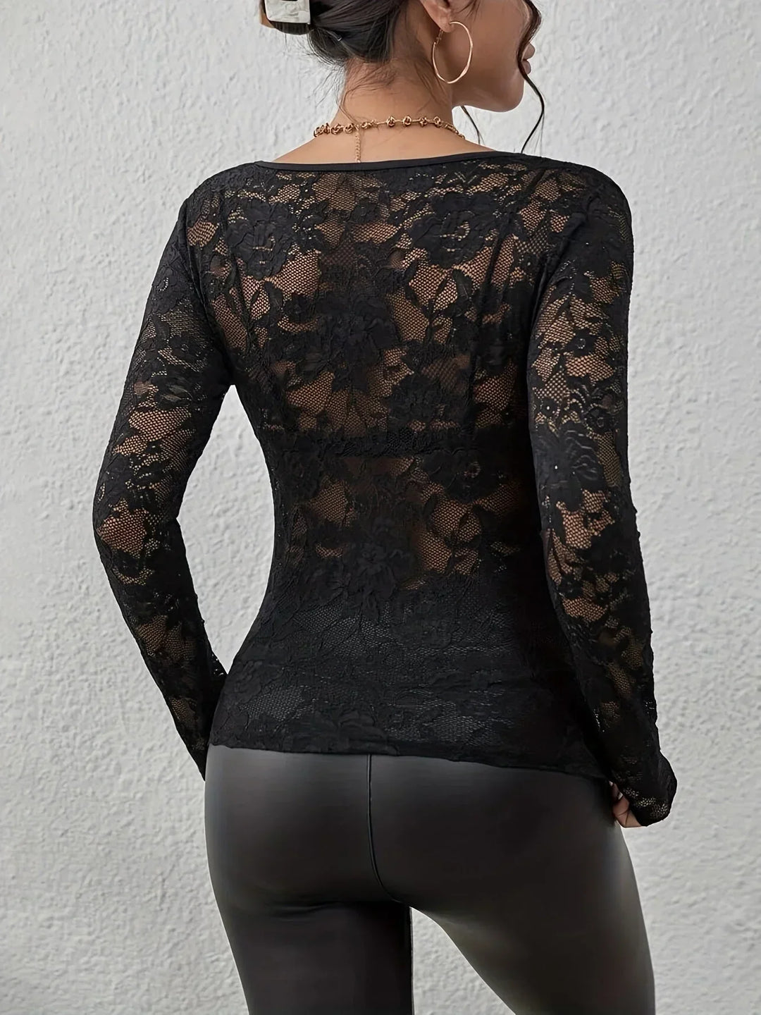 Haut en dentelle noire pour femme, manches longues, col V, adapté aux occasions spéciales.