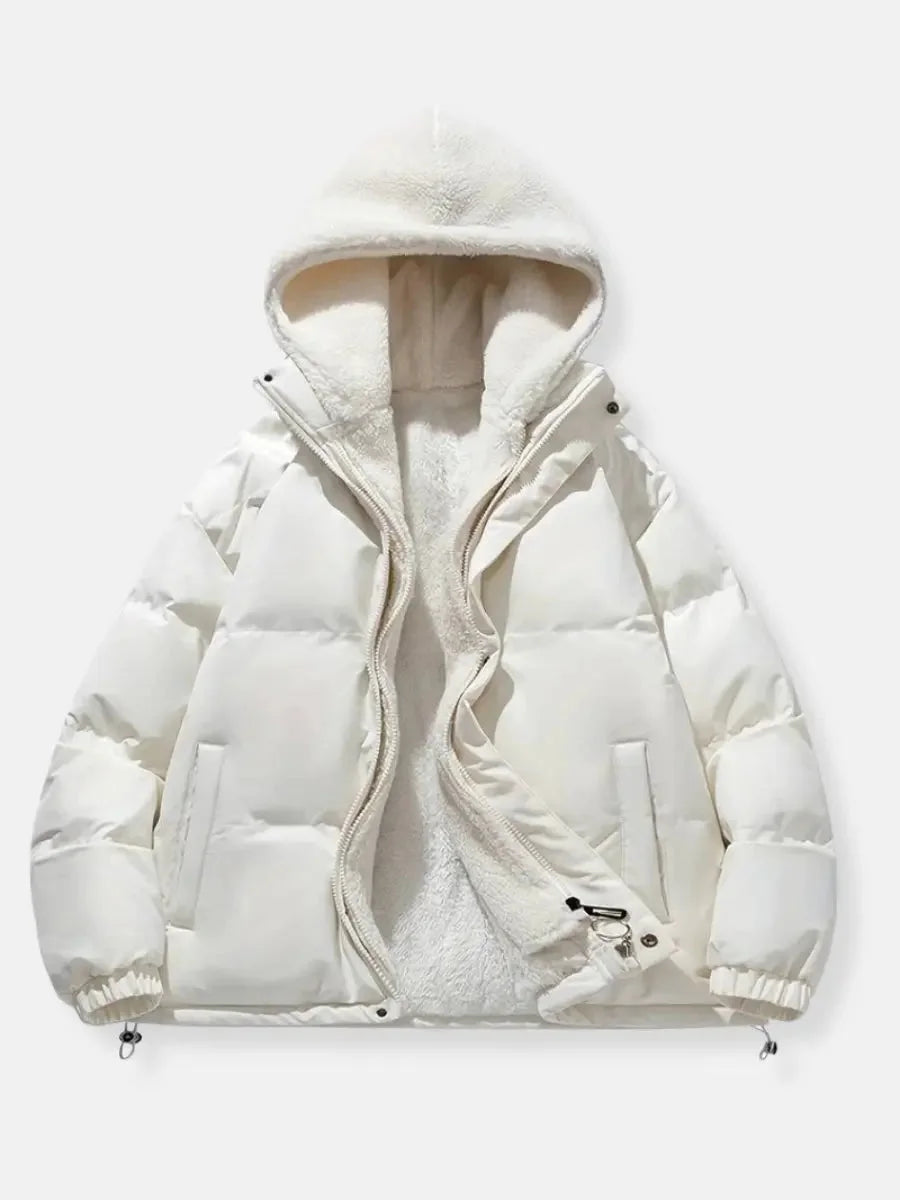 Doudoune d'hiver rose pour femme avec capuche et doublure douce, conçue pour le confort par temps froid.
