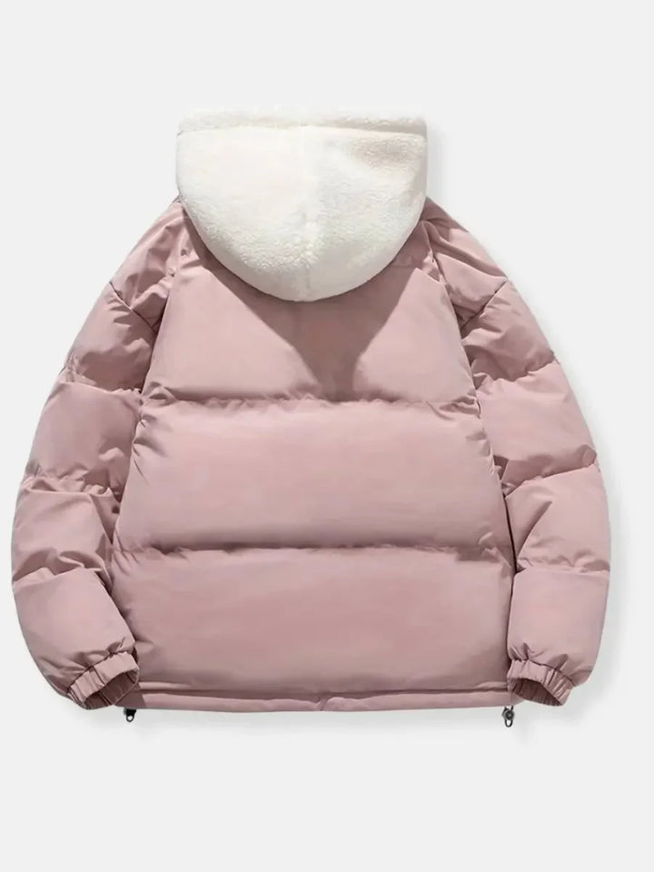 Doudoune d'hiver rose pour femme, avec capuche, doublure douce et poches pratiques.