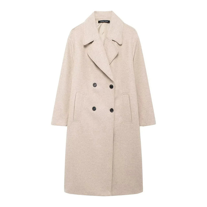 Manteau d'hiver femme beige, coupe oversize, en matériau chaud, avec poches pratiques et design intemporel.