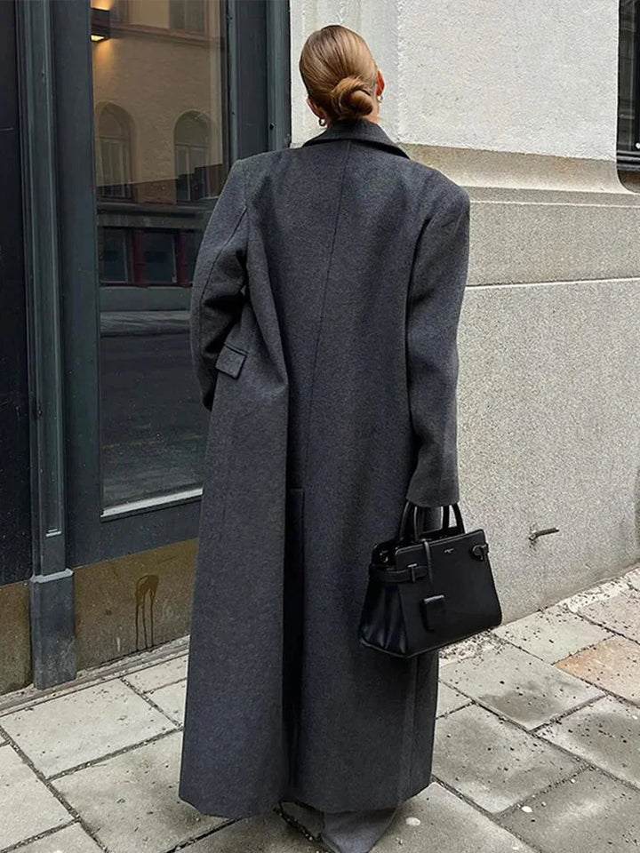 Manteau long femme bourgogne, coupe élégante, adapté à toutes les saisons, en tissu durable.