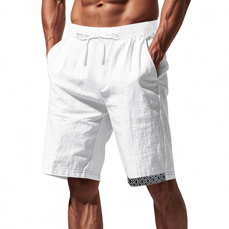 Pantaloncini uomo bianchi in lino, elastico in vita, tasche laterali, design casual estivo. Ideali per spiaggia e tempo libero.