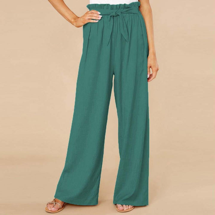 Pantaloni palazzo verdi da donna, vita alta con cintura, tessuto leggero, eleganti e casual, ideali per moda estiva e look quotidiano.