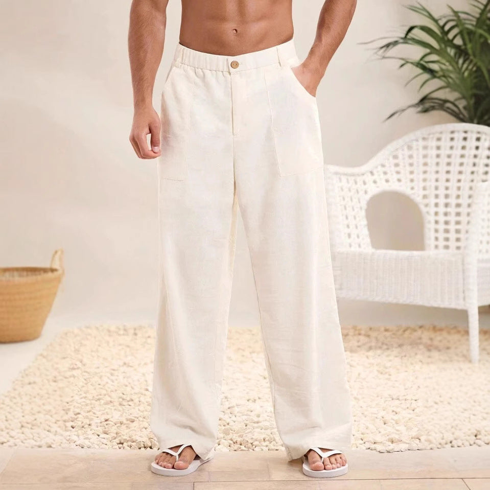 Pantaloni larghi da uomo in lino bianco, stile casual estivo, con tasche laterali. Perfetti per look rilassato in spiaggia o città.